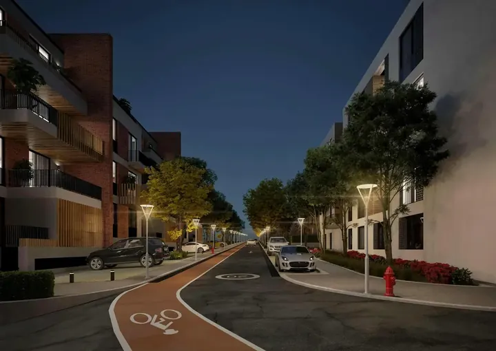 Evening pathway with a bike lane on the complex grounds